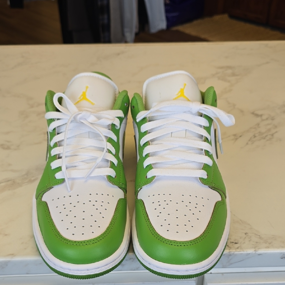 Jordans Green and White Sneakers with Yellow Logo